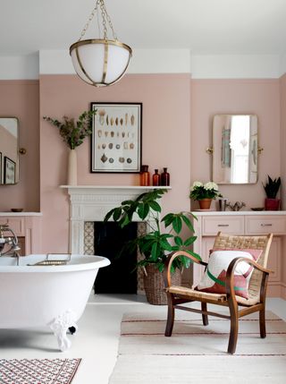 Image may contain Interior Design Indoors Room Tub Furniture Chair Bathtub and Living Room