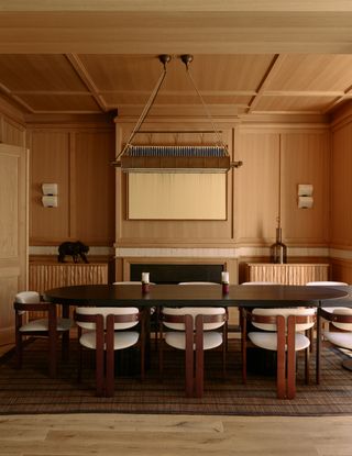 Image may contain Indoors Interior Design Architecture Building Dining Room Dining Table Furniture Room and Table
