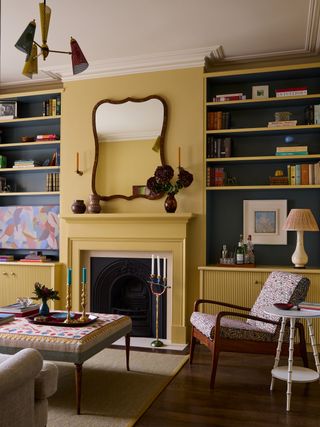 Image may contain Lamp Chair Furniture Architecture Building Indoors Living Room Room Home Decor Art and Painting