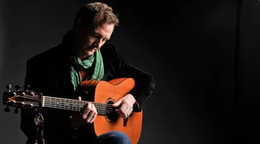 Photograph of fingerstyle guitarist John Doyle.