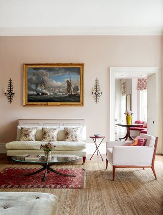 Image may contain Living Room Room Indoors Furniture Interior Design Home Decor Rug Art Painting and Table