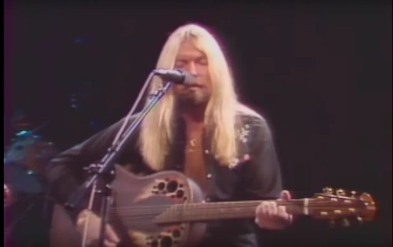 Gregg Allman plays an Ovation guitar