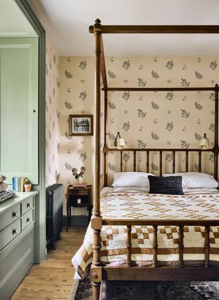 In the spare room Woodwork in Farrow  Balls ‘Lichen frames a custom version of Tess Newalls ‘Herbarium wallpaper. The...