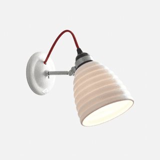 Image may contain Lamp Lighting and Lampshade