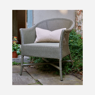 Image may contain Indoors Interior Design Furniture Cushion Home Decor Chair and Armchair